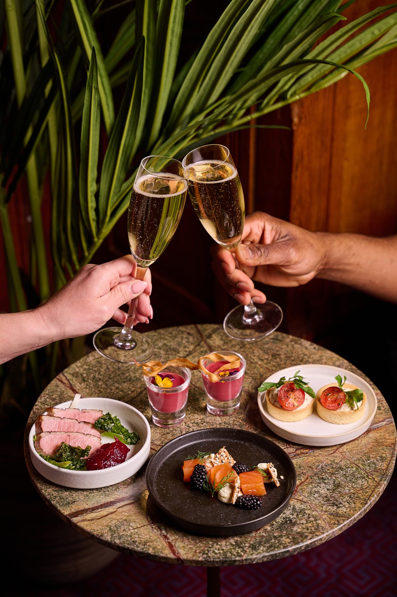 Image of champagne and small plates at the London Coliseum 