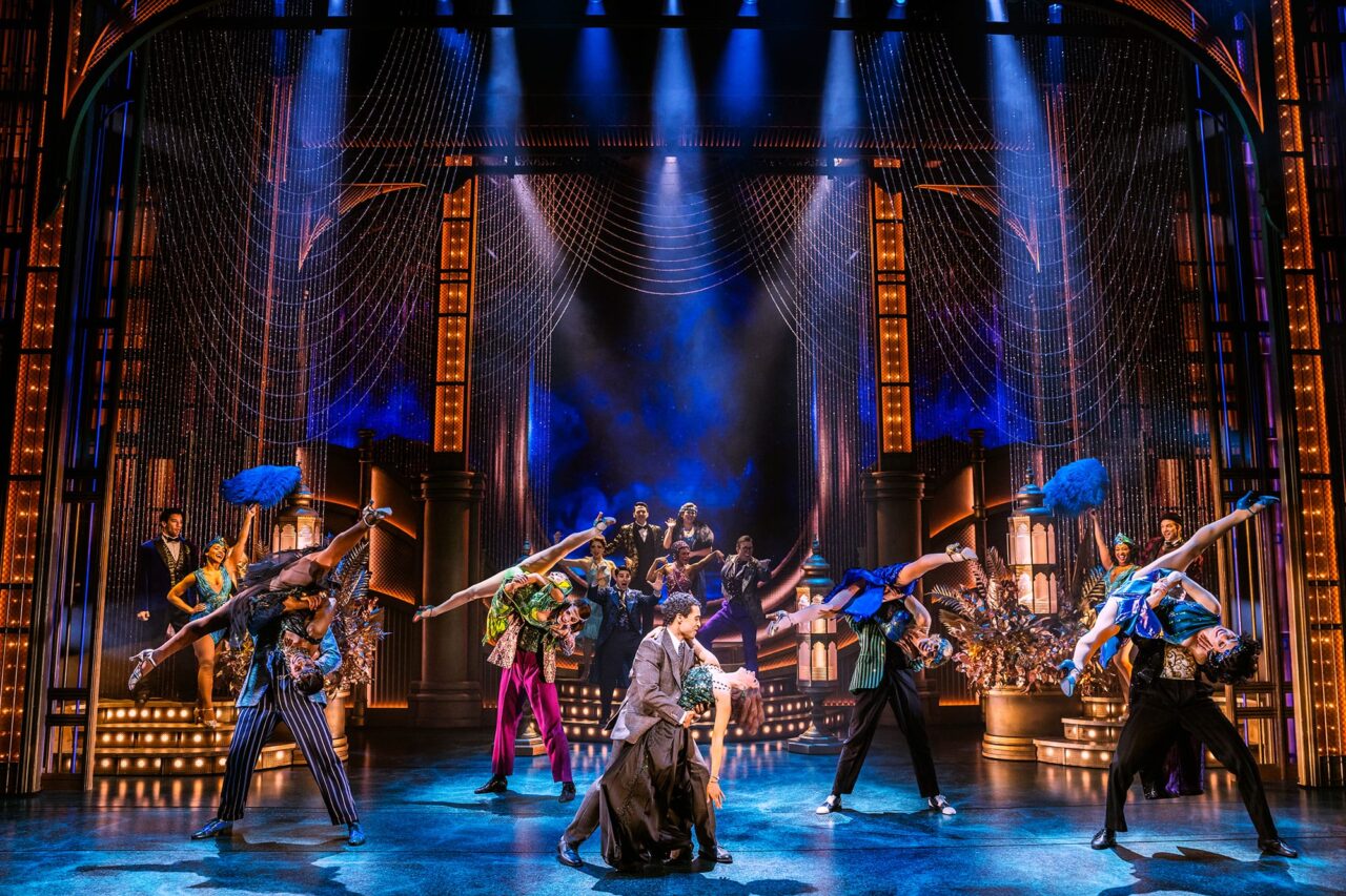 The Broadway cast on stage performing a number from The Great Gatsby